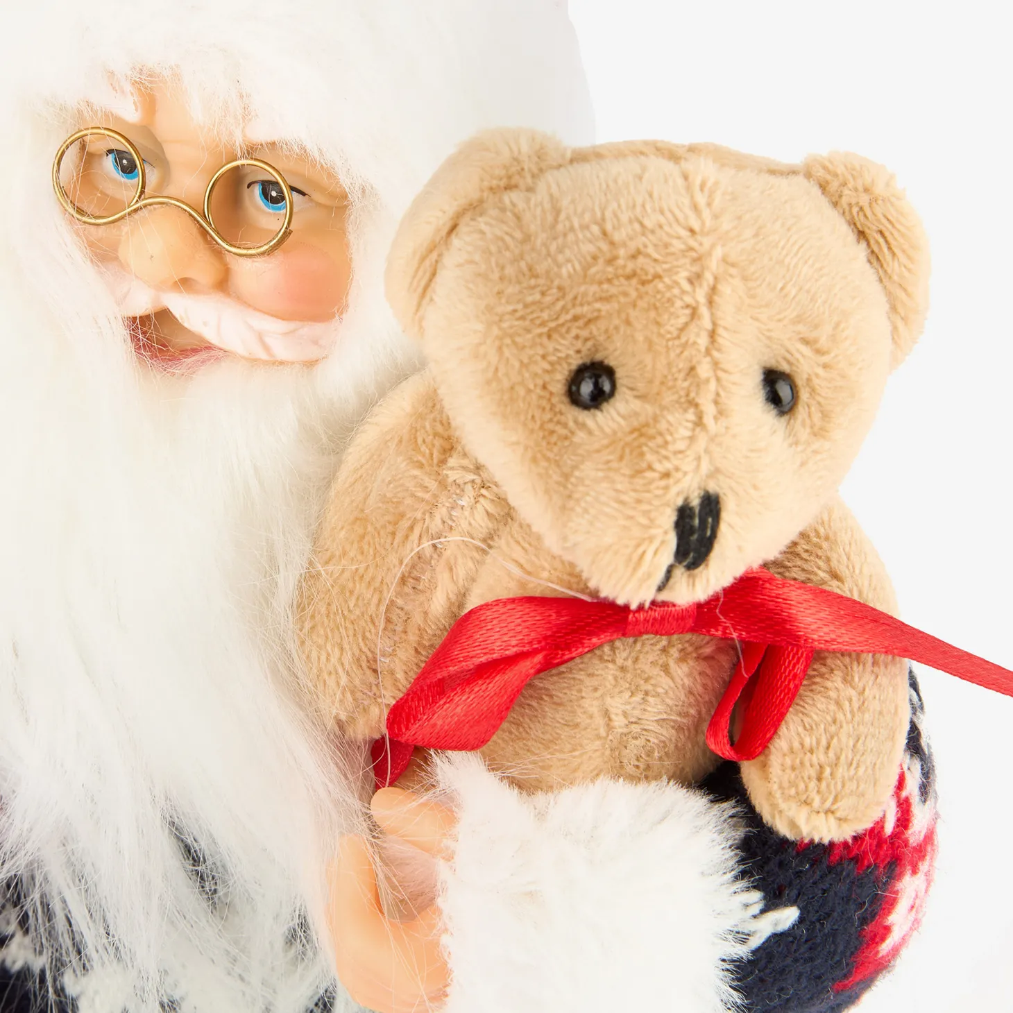 Figura decorativa Santa Claus con bolsa regalos y peluche 30cm