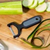 Pelador negro de filo liso de acero inoxidable - Arcos